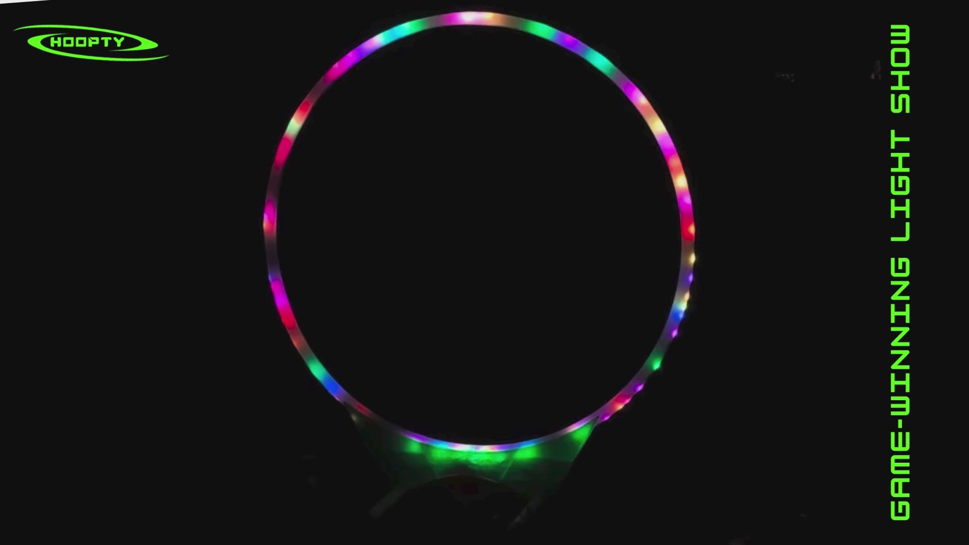 Load video: Video shows a real game of the backyard game Hoopty Disc at night with one player scoring three points, known as a Hoopty, while lightning crashes in the background.